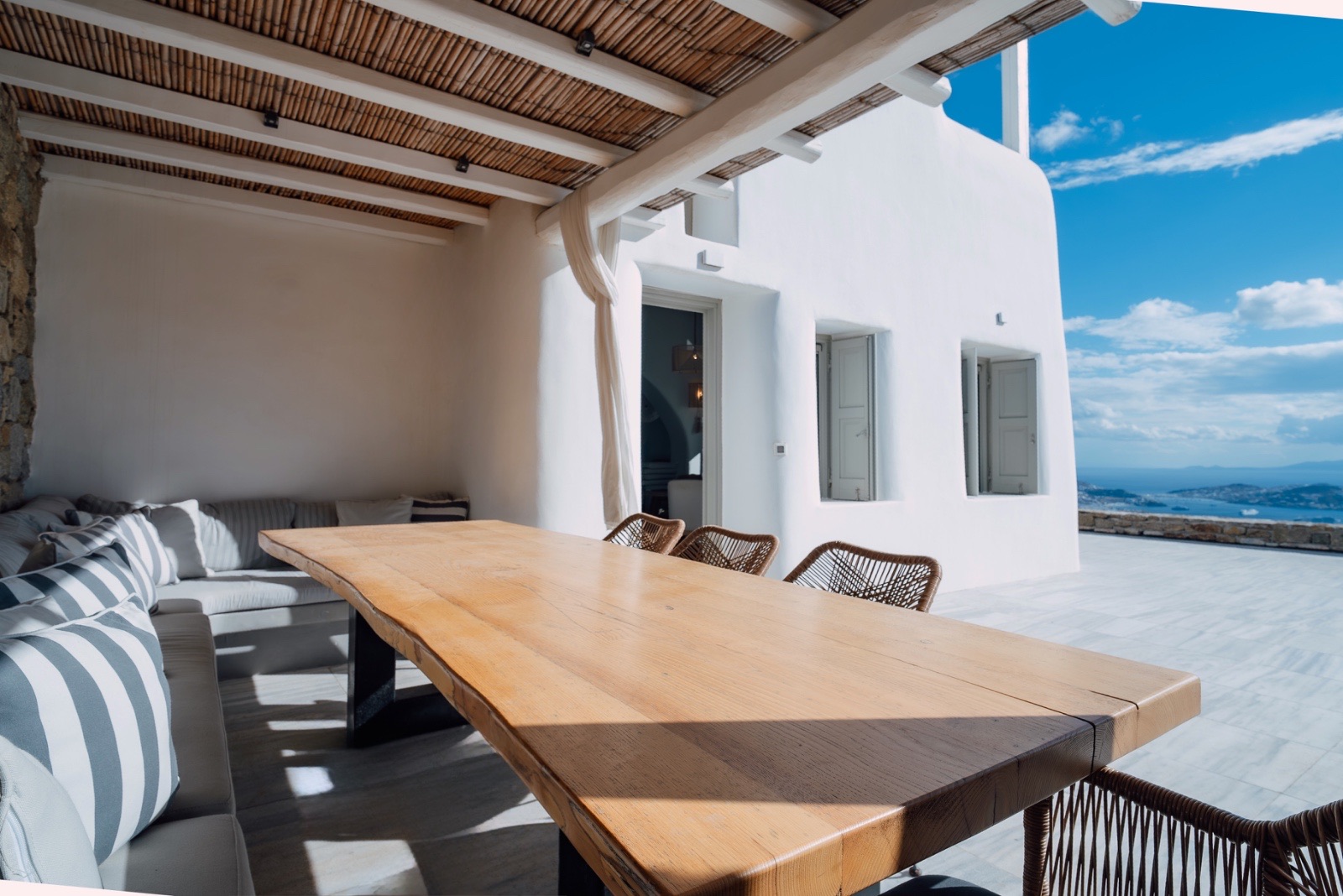 Mykonos pergola terrace with wooden table