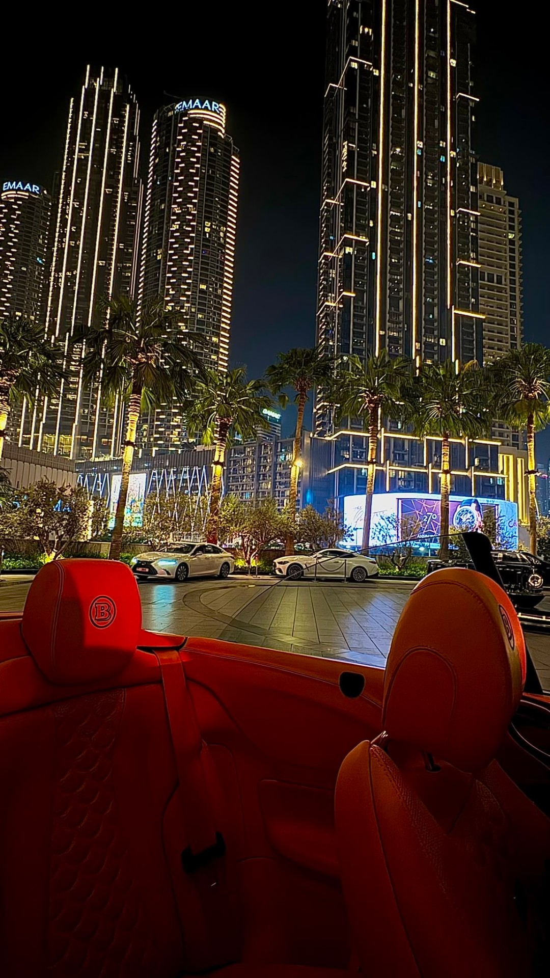 Brabus convertible in downtown Dubai at night